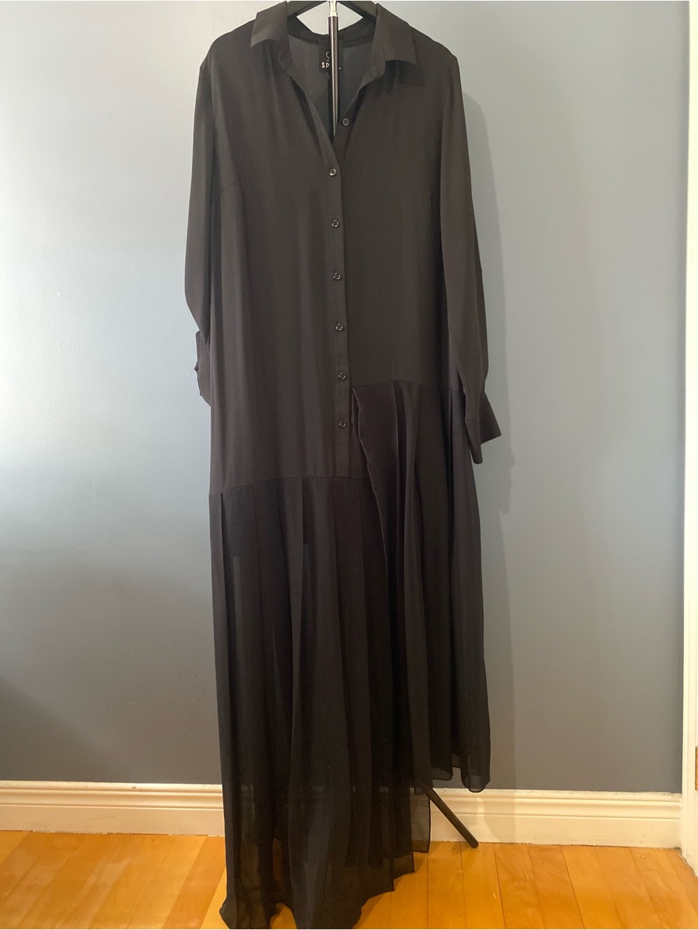 Elegant long black dress with a different twist